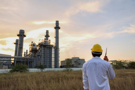 Engineer use laptop check electric power plantの写真素材