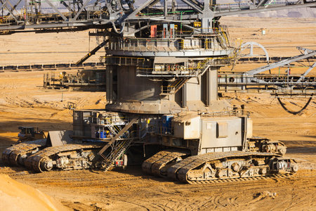 Caterpillats detail view of a giant Bucket Wheel Excavator in an endless lignite pit mine