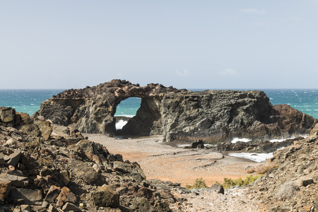 A rock arch near Ajuy in Fuerteventura, Spainの写真素材