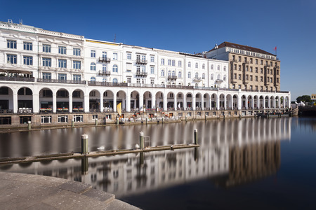 Daytime long exposure shot of the Alsterarkaden in Hamburg, Germany with reflection in a canalのeditorial素材