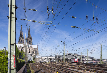 View over the tracks to Cologne Central Station and the Cologne Cathedral, Germanyの写真素材