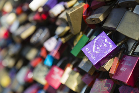 Detail view of love padlocks on the Hohenzollern Bridge in Cologne, Germanyのeditorial素材