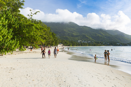 MAHE - AUGUST 08: Tourists and locals at Beau Vallon Beach in the west of Mahe, Seychelles on August 08, 2014のeditorial素材