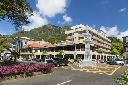 MAHE - AUGUST 04: The clock tower of Victoria also known as little Big Ben with the usual traffic in Mahe, Seychelles on August 04, 2014のeditorial素材