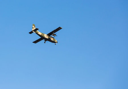 A military or government plane flying over Nairobi, Kenya.