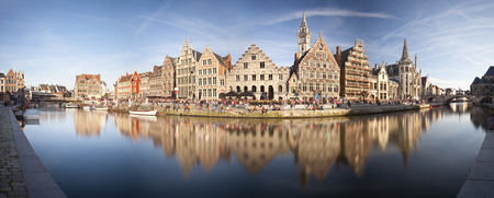 Daytime long exposure panorama of the famous canal view at Graslei in Ghent, Belgium.の写真素材