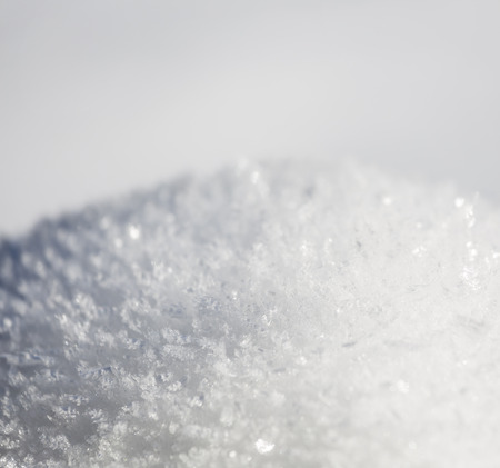 Shiny ice structures on snow after a freezing night in the Eifel, Germany.の写真素材