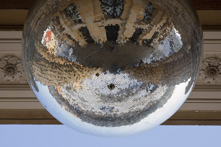 A big disco ball hanging from the roof of the Berlin Concert Hall.の写真素材