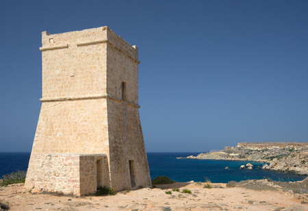 One of the many watch towers at the coastline of Malta.の写真素材