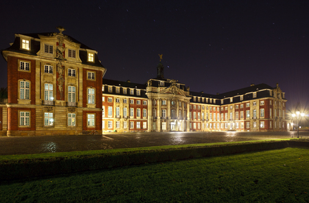 The large castle of Muenster, Germany at night which is also part of the famous university.のeditorial素材