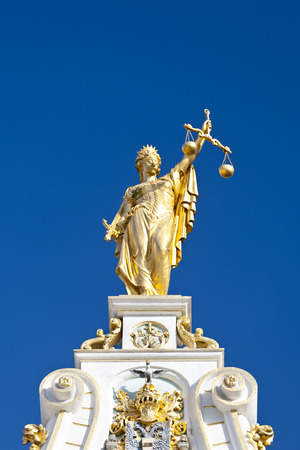 The beautiful Peace Court building on the burg square in Bruges with blue sky.のeditorial素材