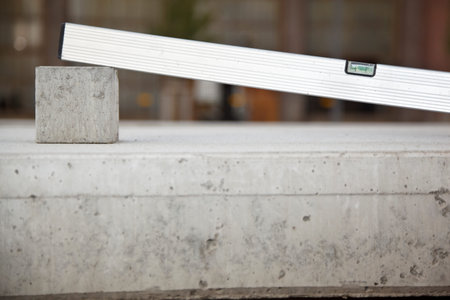 A tilted water level on concrete.の写真素材