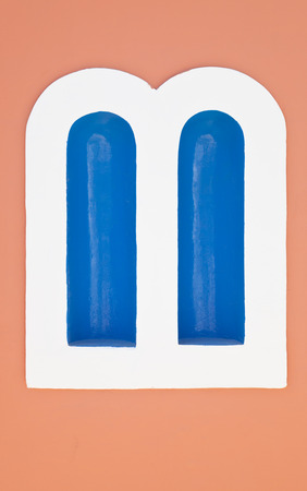 Freshly painted colorful church wall in Oia. Santorini, Greece.の写真素材