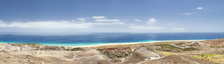 Panoramic view of the coastline near Morro del Jable in Fuerteventura, Spain.の写真素材