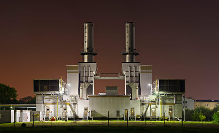 Symmetric panorama shot of an industrial gas compressor station which is part of a large chemical...