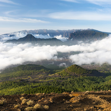 Square evening view over the mountains of La Palma with the Caldera de Taburiente in the background and Cumbre Vieja. Seen from the top of the volcano Birigoyo.の写真素材