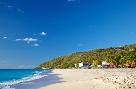 Turners Beach in Antigua with deep blue sky and turquoise water.
