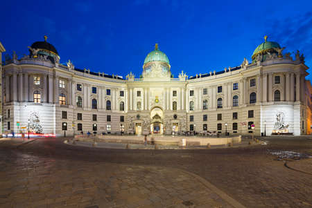 The Spanish Riding School in the Hofburg at Michaelerplatz in Vienna, Austria at night.のeditorial素材