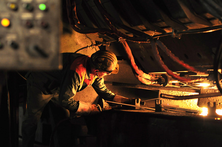 Production of steel in a steel mill - production in heavy industryの写真素材