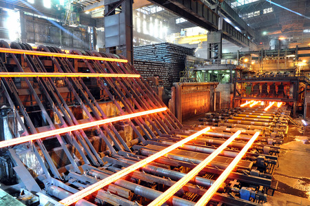 Production of steel in a steel mill - production in heavy industryの写真素材