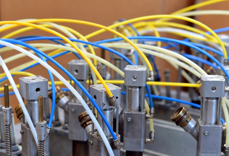 detail of a industry machine with pneumatic pipesの写真素材