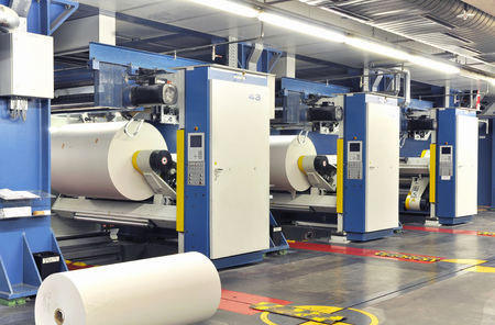 Paper rolls in a printing machine of a large print shopの写真素材