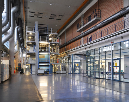factory hall with a large offset printing press in a printing plant for the production of printed products such as newspapers and magazinesの写真素材