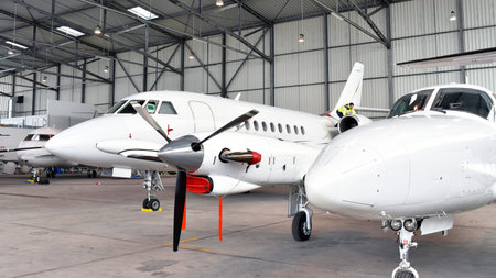Aircraft in hangar at the airport - architecture and buildings interior 