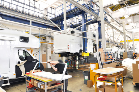 Production of camper vans / motorhomes / caravans in a factoryの写真素材