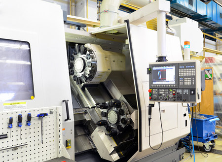 modern cnc machine for production and processing in mechanical engineeringのeditorial素材