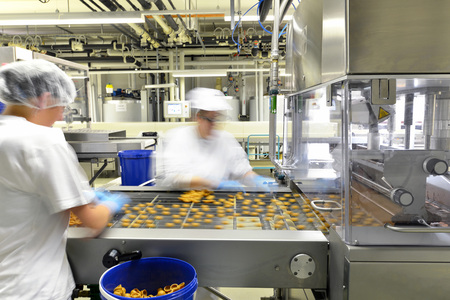Production of pralines in a factory for the food industryの写真素材