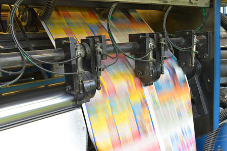 roll offset print machine in a large print shop for production of newspapers & magazines 