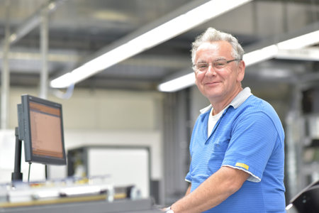 Production of electronic components in a modern factory - engineer at the workplace