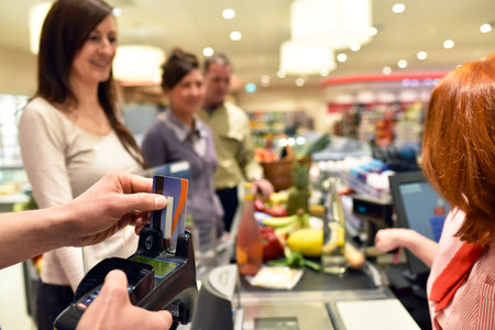 checkout and pay in the supermarrket