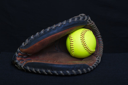 Fastpitch Softball Catchers Mitt With Yellow Ballの写真素材