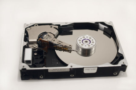 A disassembled hard drive.