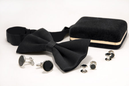 Bow tie and onyx cufflinks.