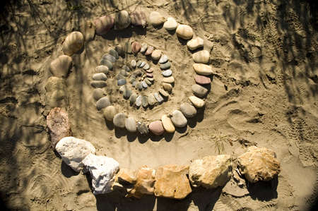 Rock spiral on the beach.の写真素材
