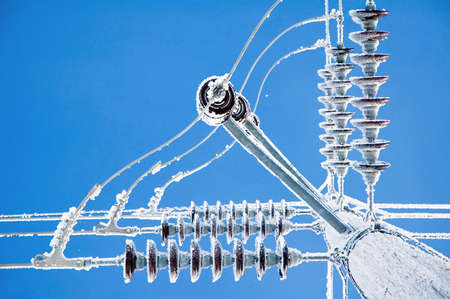 Hoar frost on a power pole and lines.の写真素材