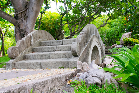 Stone Bridge in the gardenの写真素材