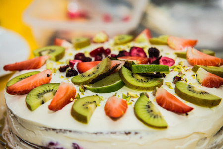 Fresh fruit tart in sunlight. の写真素材
