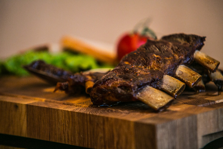 Pork rib roast with oven fresh vegetables.の写真素材