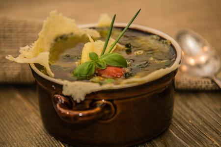 fish soup on a wooden table.の写真素材
