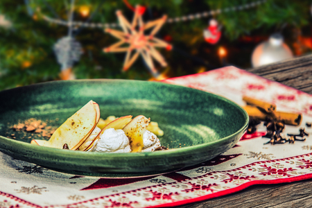 Homemade tasty christmas delicacy with apples and cinnamon.の写真素材