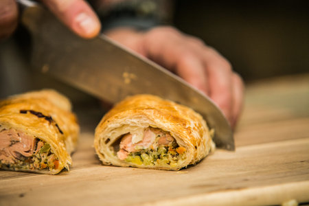 The chef in the kitchen prepares  food with.の写真素材