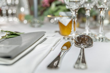 Beautiful table set for some festive event, party or wedding reception. Design, formal. Closeup