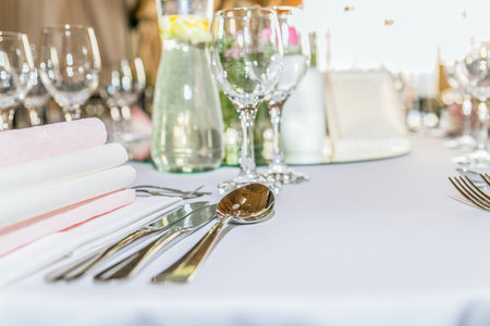 Beautiful table set for some festive event, party or wedding reception. Design, formal. Closeup