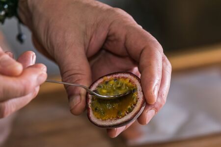 Close up hands of chef preparing food in the kitchen of a restaurant, cooking conceptの写真素材