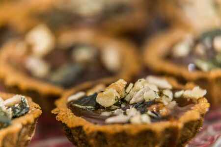 Cakes for christmas. Sweet cakes at a bakery for Christmas eve. Christmas winter food compositionの写真素材