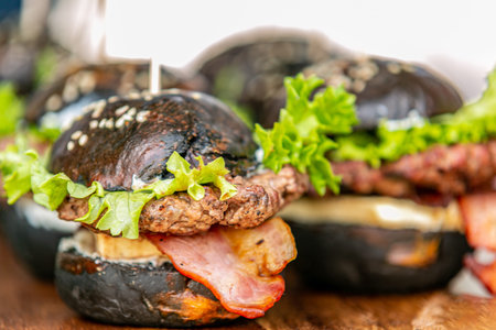 Sandwich hamburger with and mix of vegetables. Fast food. Delicious hamburger